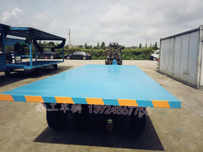 1677034940399911.jpg 7噸沙地充氣胎平板拖車2I.jpg