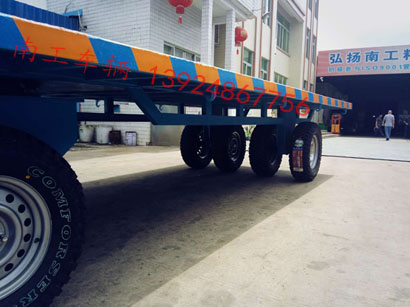 1677034974672969.jpg 7噸沙地充氣胎平板拖車5I.jpg
